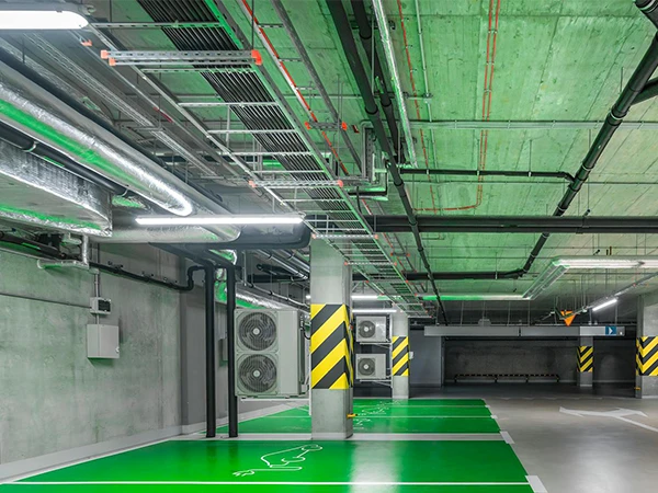 U-shaped steel cable ladder in an underground parking garage