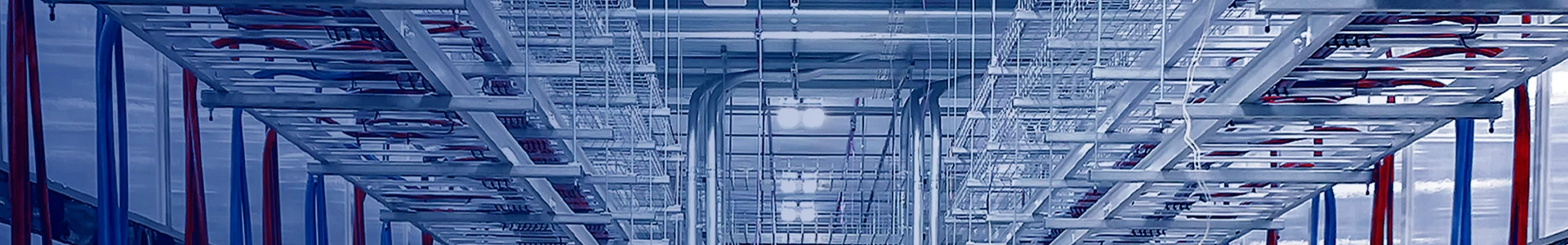 Multi-tier cable trays in an electromechanical center for cable management