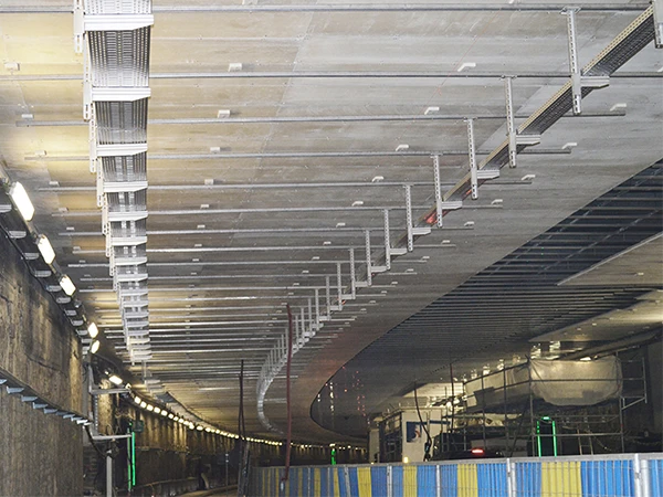 Suspended cable tray inside a tunnel