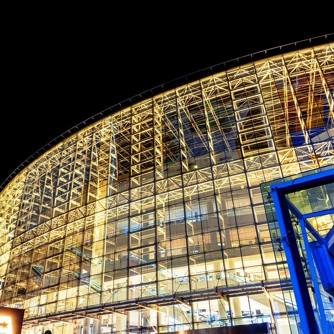 Commercial building brightly lit at night
