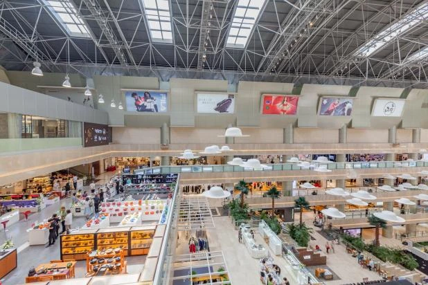 Brightly illuminated interior of a shopping mall