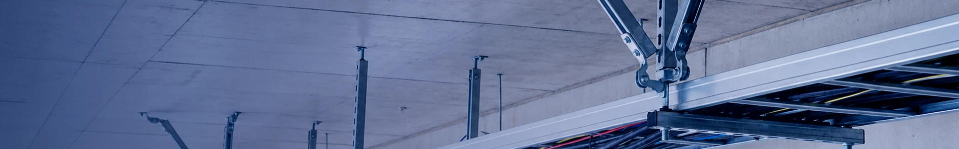 Reinforcing cable tray systems with seismic bracing